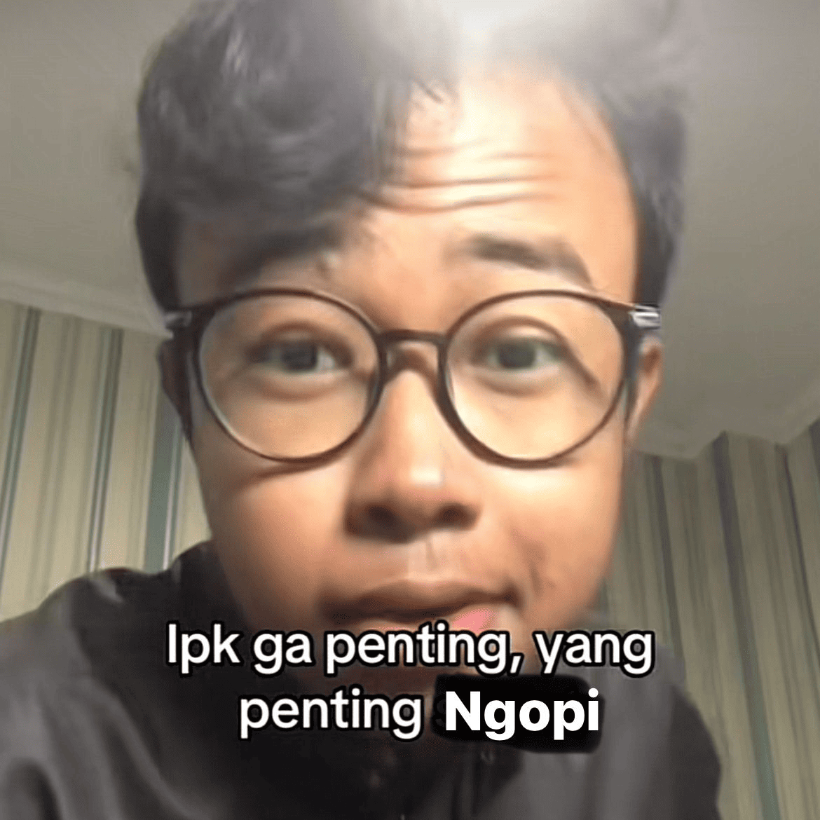 Beautiful latte art in a ceramic cup on a wooden counter